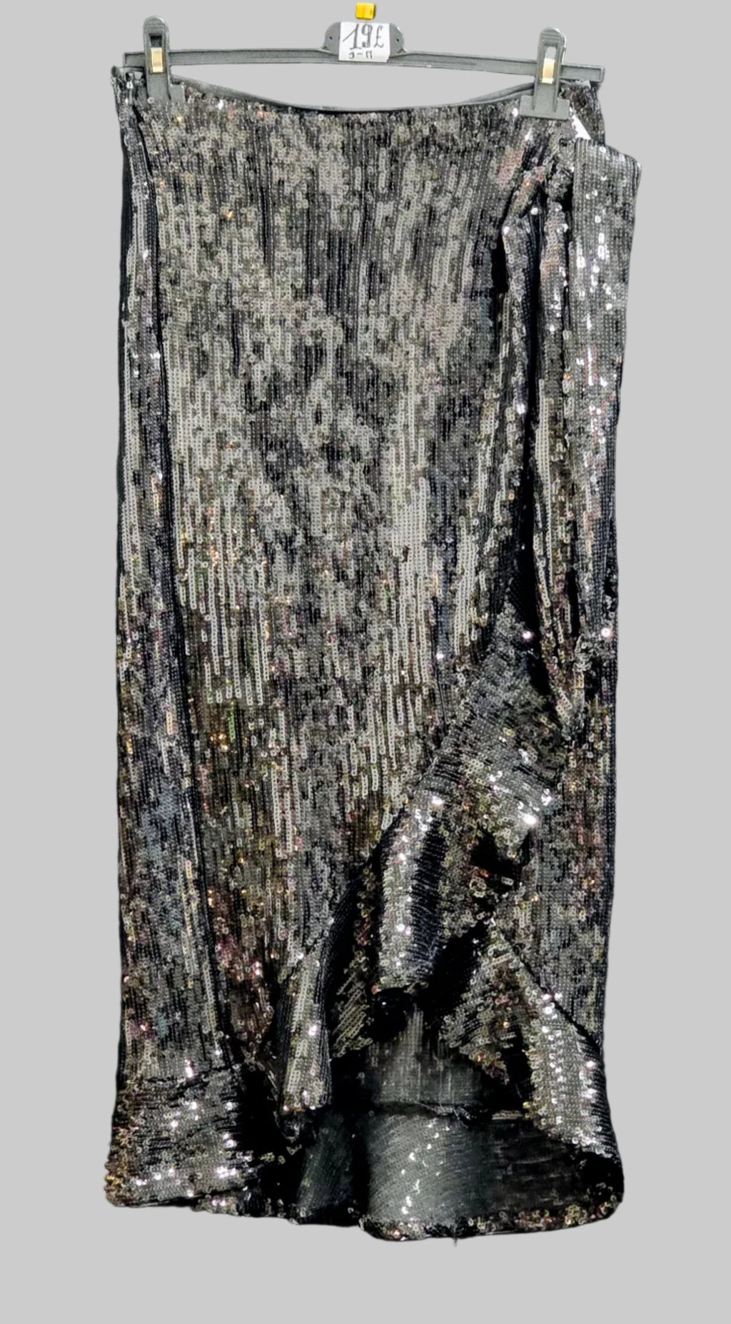 Black and silver sequin maxi skirt with straight hem and side drape
