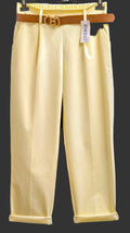 Yellow women's trousers with tan summer belt and gold buckle at waistband