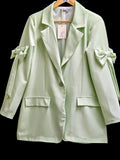 Mint green women's blazer jacket with bow cuffs, notch lapel, single-button front, pockets