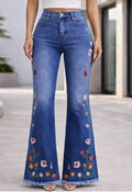Blue flare jeans with floral embroidery at hems and legs