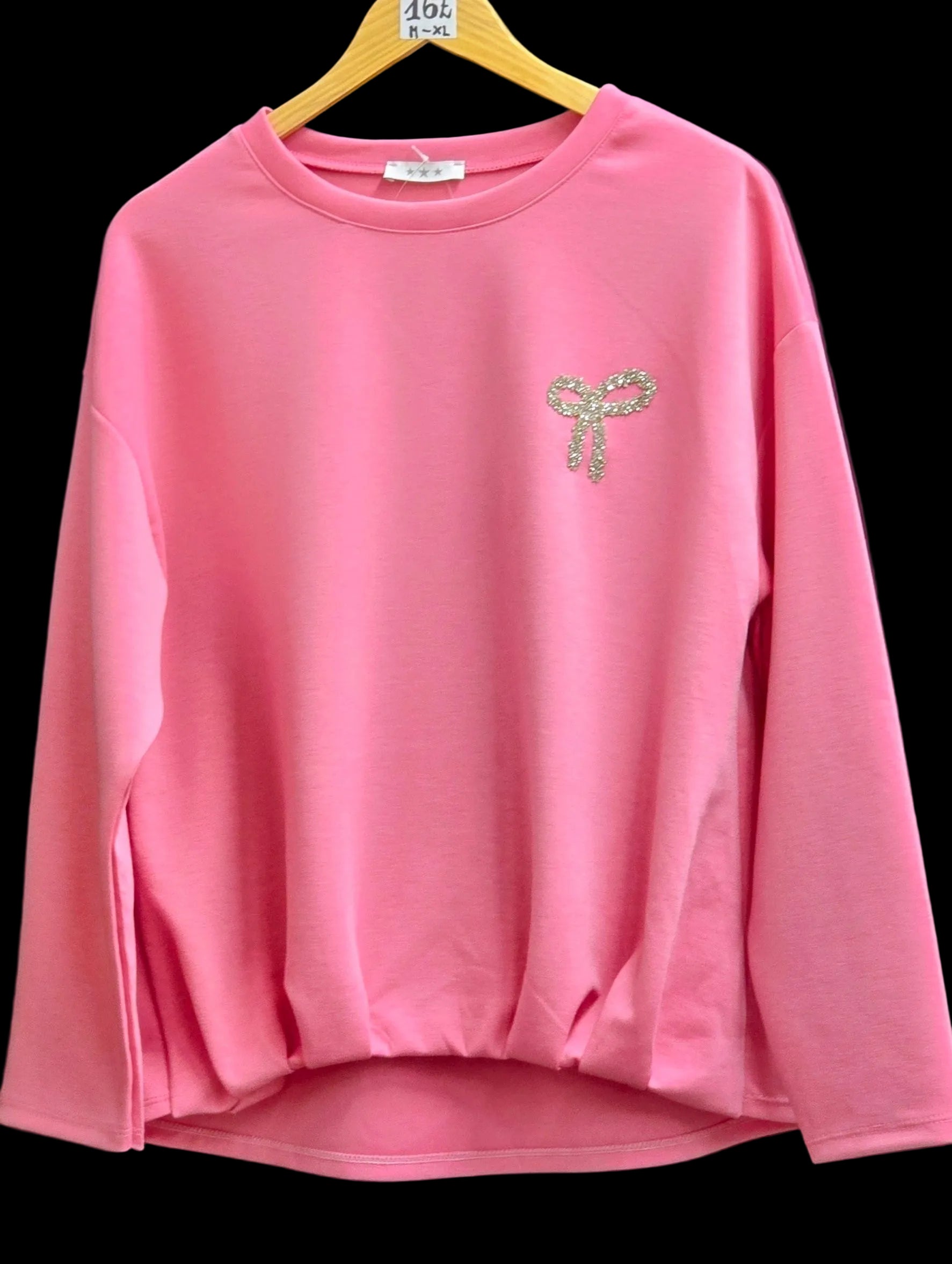 Pink women's sweatshirt with rhinestone bow detail on chest