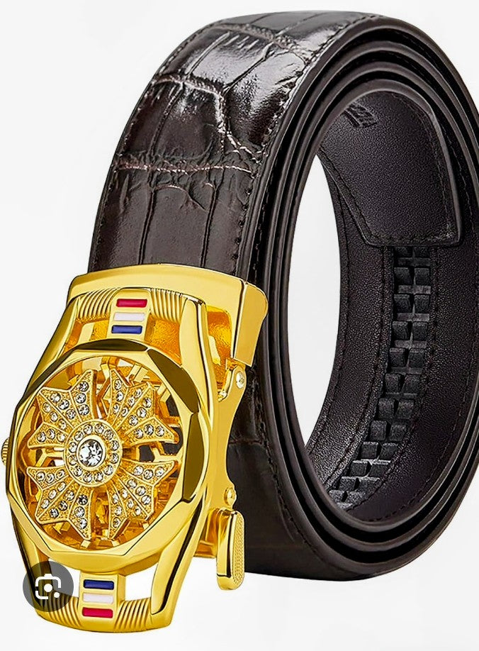 Dark leather men's belt with gold buckle and jeweled center emblem, decorative inlays