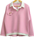 Pink women's sweatshirt with mint collar, small chest pocket, ribbed hem.