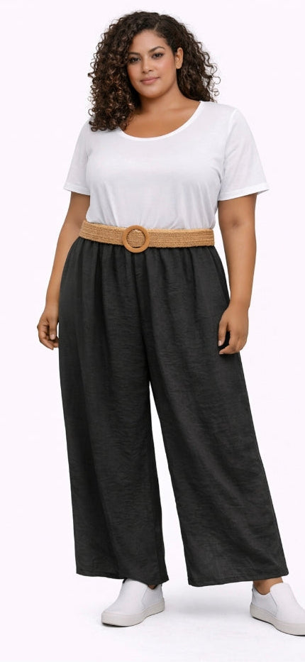 Wide-leg women's trousers with tan belt and round buckle, dark charcoal fabric