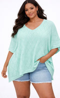 Mint green plus-size knit sweater with V-neck and diamond pattern, short sleeves