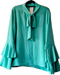 Women’s teal tied-neck blouse with bow, long flared sleeves and ruffle cuffs