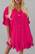Women's dark pink tunic with V-neck button front, pleated texture, ruffle cuffs and hem