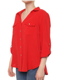 Red button-up shirt with collar, chest pocket, and tabbed sleeves