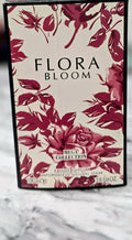 Flora Bloom eau de parfum bottle box with burgundy floral pattern, 100 ml label