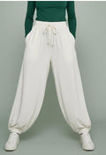 White balloon trousers for women with elastic cuffs and drawstring waistband