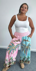 Satin-style wide-leg trousers, tropical palm print with elastic waistband, pink and blue