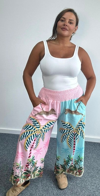 Satin-style wide-leg trousers, tropical palm print with elastic waistband, pink and blue