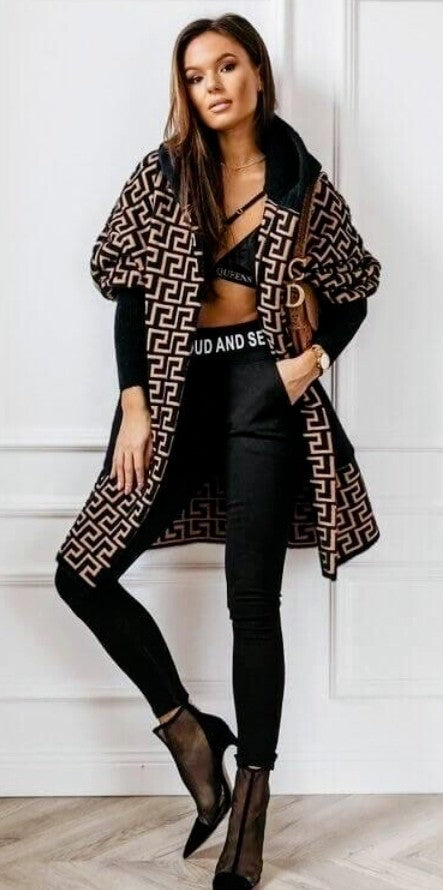 Longline hooded cardigan with open front, black and cream geometric pattern.