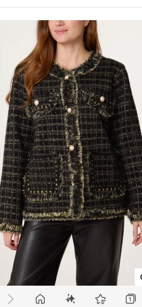 Women's Chanel-style open-front tweed cardigan sweater, dark with gold buttons and frayed hem