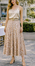 Leopard print belted midi skirt in tan with light brown pattern, flowy A-line fit