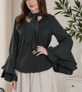 Black blouse with bow tie neck and flared sleeves