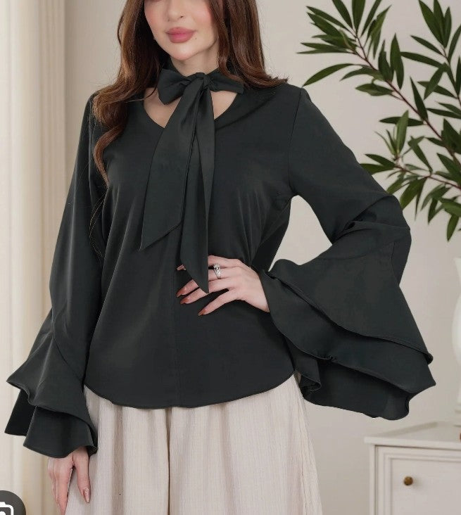 Black blouse with bow tie neck and flared sleeves