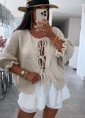 Women's tied sweater in light beige fuzzy knit, long sleeves, front lace-up tie detail